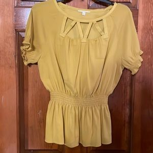 Gianni Binni gold blouse with cut out around neck cinched waist with peplum